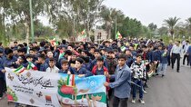 راهپیمایی دانش‌آموزان مجموعه مدارس امام حسین (ع) دویست دستگاه فولاد خوزستان